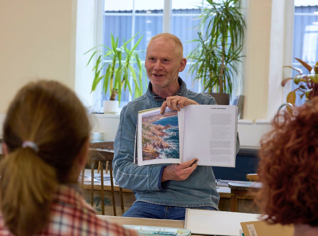 Paul Lewin sharing his art book